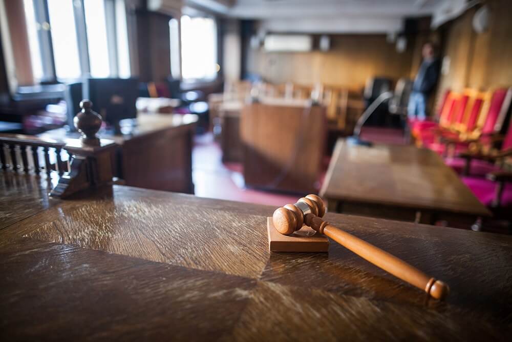 Color image of a hammer in a courtroom